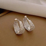Boucles d'oreilles créoles en argent incrustées de cristaux