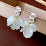 Boucles d'oreilles pétales de perles avec cristal étincelant