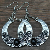 Boucles d'oreilles vintage en argent tibétain sculpté
