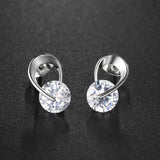 Boucles d'oreilles classiques en argent avec pierres précieuses transparentes scintillantes