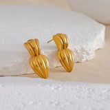 Boucles d'oreilles vintage sculptées en or