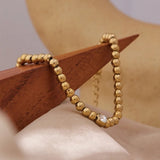 Bracelet vintage en cristal et perles dorées