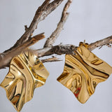 Boucles d'oreilles vintage en or ondulées