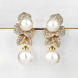 Boucles d'oreilles vintage en forme de fleur avec perles