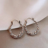 Boucles d'oreilles créoles vintage en cristal torsadé et argent