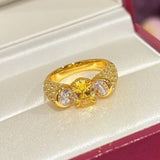 Bague ajustable vintage en or et pierre précieuse jaune