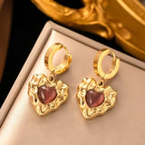 Boucles d'oreilles pendantes en forme de cœur texturé doré