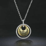 Collier vintage en argent et or avec motif tourbillonnant