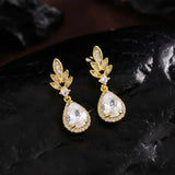 Boucles d'oreilles vintage en or avec pendentifs en cristal