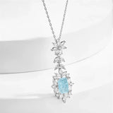 Collier vintage en argent bleu glacier à motif floral