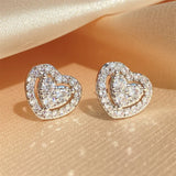 Boucles d'oreilles vintage en argent avec cœur étincelant