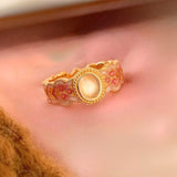 Bague ajustable vintage en or avec cristal rose ovale unique en forme de fleur
