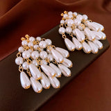 Boucles d'oreilles pendantes vintage avec grosses perles en forme de goutte d'eau