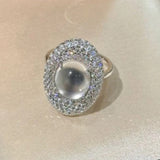 Bague ajustable intemporelle en argent, pierre de lune et cristal