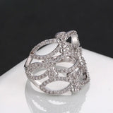 Bague vintage classique en argent avec halo floral