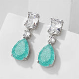 Boucles d'oreilles pendantes vintage en argent et pierres précieuses vertes