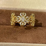 Bague vintage ajustable en or et diamants avec motif floral
