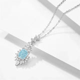 Collier vintage en argent avec pierre précieuse bleue