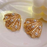 Boucles d'oreilles vintage en or et perles de coquillage