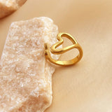 Bague vintage ajustable en or avec symbole d'amour