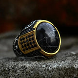 Bague vintage en marbre noir et or