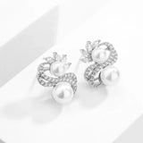 Boucles d'oreilles vintage en forme de feuille avec perles blanches