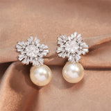 Boucles d'oreilles vintage en forme de flocon de neige avec perle