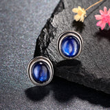 Boucles d'oreilles en argent avec pierres précieuses bleu nuit