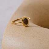 Bague vintage en or avec pierre précieuse brune