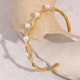 Bracelet vintage en or torsadé avec perles