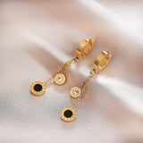 Boucles d'oreilles vintage en or et cristal noir