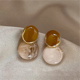Boucles d'oreilles vintage en or aux tons terreux