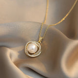 Collier pendentif perle cercle torsadé en or