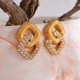 Boucles d'oreilles vintage en or entrelacées scintillantes