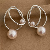 Boucles d'oreilles pendantes vintage en fil d'argent et perles