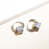 Boucles d'oreilles vintage en argent avec breloques roulantes