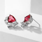 Boucles d'oreilles vintage en argent avec cristaux rouges