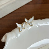Boucles d'oreilles papillon vintage en or et perles