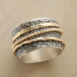 Bague tournante vintage à motif baroque
