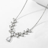 Collier vintage avec pendentif en forme de feuille en argent