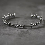 Bracelet vintage gothique en argent barbelé