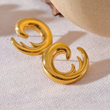 Boucles d'oreilles vintage abstraites en or courbé