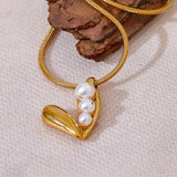 Collier vintage avec perles et cœur en or