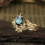 Bague vintage à pierre verte et motif floral