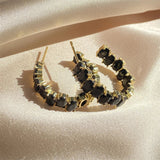Boucles d'oreilles créoles vintage en or et cristal noir
