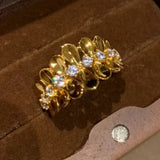 Bague vintage ajustable en or et diamants, sertie de fleurs et de feuilles brillantes