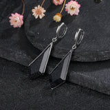 Boucles d'oreilles vintage en argent et cristal noir