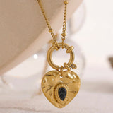 Collier vintage avec pendentif cœur en pierre noire