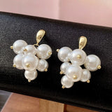 Boucles d'oreilles sophistiquées vintage en or et perles