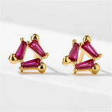 Boucles d'oreilles triangle en or avec pierres rouges